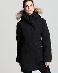 Canada Goose's mid-thigh length parka provides ultra protection from the cold. The hood boasts a removable coyote fur ruff and concealed snap collar for added warmth.