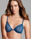 All-over lace and scalloped trim lend allure to this underwire bra from Calvin Klein Underwear. Style #F3535.