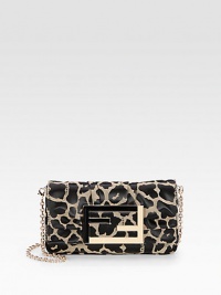 Chic leopard-print jacquard, softly-pleated in a flap-front bag, finished with logo hardware.Detachable shoulder strap, 22½ dropMagnetic snap flap closureOne inside open pocketCotton lining9W X 6H X 2DMade in Italy Chic leopard-print jacquard, softly-pleated in a flap-front bag, finished with logo hardware.Detachable shoulder strap, 22½ dropMagnetic snap flap closureOne inside open pocketCotton lining9W X 6H X 2DMade in Italy