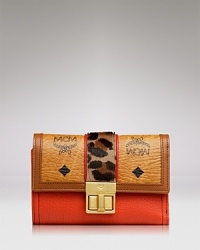 Master the heritage trend with this leather wallet from MCM. A striking, statement piece, this accessory flaunts a bold design and pockets for all the essentials. Master the heritage trend with this leather wallet from MCM. A striking, statement piece, this accessory flaunts a bold design and pockets for all the essentials.