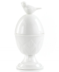 Whiteware gets whimsical. A figural bird and branches sculpted in fresh white porcelain make this Martha Stewart Collection egg cup a charmer on casual tables. Whiteware gets whimsical. A figural bird and branches sculpted in fresh white porcelain make this Martha Stewart Collection egg cup a charmer on casual tables.