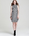 Boy-meets-girl style arrives with this 10 Crosby Derek Lam plaid dress, rendered in soft flannel for a sumptuous fall. Rock it cool-girl style with booties or brogues and add a dose of attitude just because...