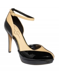 Dramatic lines make Jessica Simpson's Delilia platform pumps so sophisticated. A softly pointed closed toe and a dainty ankle strap closure complete the look with class. Dramatic lines make Jessica Simpson's Delilia platform pumps so sophisticated. A softly pointed closed toe and a dainty ankle strap closure complete the look with class.