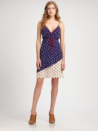 Invoke seaside vibes in this silken silhouette with a vintage print, self-tie and contrast trim. Crossover v-neckSpaghetti strapsWaist self-tieAbout 28 from natural waistSilkDry cleanImportedModel shown is 5'10 (177cm) wearing US size Small. Invoke seaside vibes in this silken silhouette with a vintage print, self-tie and contrast trim. Crossover v-neckSpaghetti strapsWaist self-tieAbout 28 from natural waistSilkDry cleanImportedModel shown is 5'10 (177cm) wearing US size Small.