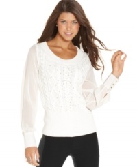 Adorned with cute studs, this cable-knit sweater from XOXO will keep you warm and fashion-forward at the same time! Adorned with cute studs, this cable-knit sweater from XOXO will keep you warm and fashion-forward at the same time!