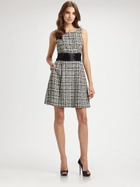 Two-tone tweed in a chic, structured shift, accented by a sequined contrast waistband.Jewel necklineSleevelessSequined contrast waistbandSide slash pocketsSkirt pleatsConcealed back zipAbout 23 from natural waist68% cotton/32% polyamideDry cleanMade in USAModel shown is 5'11 (180cm) wearing US size 4. Two-tone tweed in a chic, structured shift, accented by a sequined contrast waistband.Jewel necklineSleevelessSequined contrast waistbandSide slash pocketsSkirt pleatsConcealed back zipAbout 23 from natural waist68% cotton/32% polyamideDry cleanMade in USAModel shown is 5'11 (180cm) wearing US size 4.