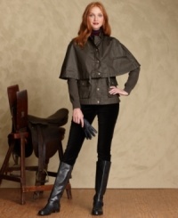 Rugged style gets reinvented with Tommy Hilfiger's chic cape jacket, rendered from a waxed cotton blend. Rugged style gets reinvented with Tommy Hilfiger's chic cape jacket, rendered from a waxed cotton blend.
