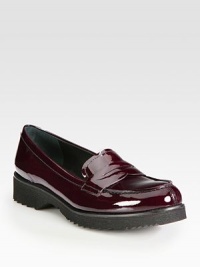 Classic patent penny loafer style. Rubber heel, 1¼ (30mm)Rubber platform, ½ (15mm)Compares to a ¾ heel (20mm)Patent leather upperLeather liningRubber trek solePadded insoleImported Classic patent penny loafer style. Rubber heel, 1¼ (30mm)Rubber platform, ½ (15mm)Compares to a ¾ heel (20mm)Patent leather upperLeather liningRubber trek solePadded insoleImported