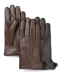 Insulate your hands in the classic luxury of fur, protected by a supple leather exterior that complements your fine outerwear. Insulate your hands in the classic luxury of fur, protected by a supple leather exterior that complements your fine outerwear.