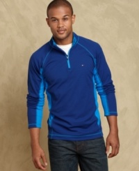 Contrast colors put a cool modern spin on this classic design from Tommy Hilfiger. Contrast colors put a cool modern spin on this classic design from Tommy Hilfiger.