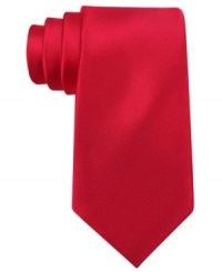 Start your day on a solid note with this sharp silk tie from Tommy Hilfiger. Start your day on a solid note with this sharp silk tie from Tommy Hilfiger.