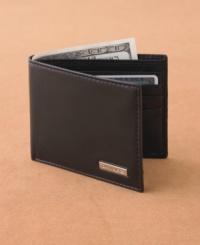 With sophisticated, classic styling, this Tommy Hilfiger passcase wallet subtly punctuates your look. With sophisticated, classic styling, this Tommy Hilfiger passcase wallet subtly punctuates your look.