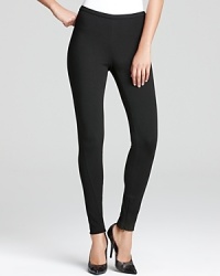 Contoured seaming crafts razor-sharp Lafayette 148 New York pants, touting zip cuffs for a touch of rocker-chic. Contoured seaming crafts razor-sharp Lafayette 148 New York pants, touting zip cuffs for a touch of rocker-chic.
