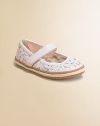 A charming pattern of cutout daisies with rhinestone centers defines this sweet Mary Jane style with jute edging.Faux leather upperGrip tape close strapRhinestone accentsPadded insoleTextured composite rubber sole with jute edgingFaux leather liningImported