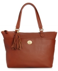 Take your look instantly uptown with this posh carryall from Tommy Hilfiger. Crafted from soft, pebbled leather with signature detailing, its generous shape is ideal for work or weekends. Take your look instantly uptown with this posh carryall from Tommy Hilfiger. Crafted from soft, pebbled leather with signature detailing, its generous shape is ideal for work or weekends.