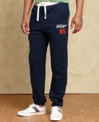 Cool casual comfort is easy to come by with these athletic pants from Tommy Hilfiger. Cool casual comfort is easy to come by with these athletic pants from Tommy Hilfiger.
