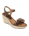 Hello summer temptress. Bare Traps' Tease wedge sandals are decorated with flowers and stones and waiting for adventure.