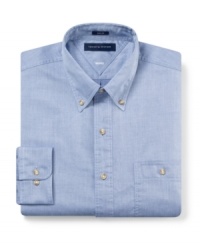 Slim-fit tailoring adds to the sleek appeal of this versatile dress shirt from Tommy Hilfiger. Slim-fit tailoring adds to the sleek appeal of this versatile dress shirt from Tommy Hilfiger.