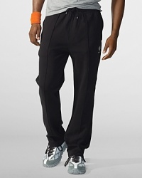 Rendered in luxe Pima fleece, a stretchy athletic pant features utility side zip and back pockets, plus a large RLX logo at the left leg. Rendered in luxe Pima fleece, a stretchy athletic pant features utility side zip and back pockets, plus a large RLX logo at the left leg.