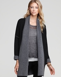 A luxuriously soft, double-faced Vince coat arrives in cashmere-kissed wool and features a contrast draped front and cuffs. A luxuriously soft, double-faced Vince coat arrives in cashmere-kissed wool and features a contrast draped front and cuffs.