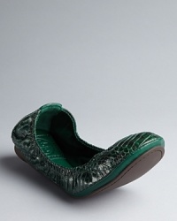 Snake it up; slither into these Tory Burch ballet flats for sensational style. The signature Eddie design is crafted of genuine watersnake. Snake it up; slither into these Tory Burch ballet flats for sensational style. The signature Eddie design is crafted of genuine watersnake.