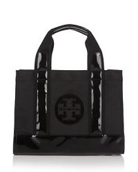 Express your Tory Burch style with this chic nylon tote -- one of her bestsellers in a stylish miniature size. Express your Tory Burch style with this chic nylon tote -- one of her bestsellers in a stylish miniature size.