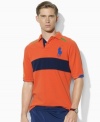 Rendered in breathable cotton mesh, Ralph Lauren's official limited edition US Open polo shirt embraces athletic style in sporty color-blocked design that's highlighted by a trim, modern fit.