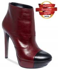 So sleek and sophisticated. Jessica Simpson's Essas platform booties have a contrasting cap toe and a zipper that lines the back heel. So sleek and sophisticated. Jessica Simpson's Essas platform booties have a contrasting cap toe and a zipper that lines the back heel.