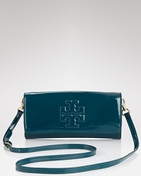 For night, Tory Burch dresses up it's clutch in glossy patent leather. Ideally sized to tuck inside a tote and take to dinner. it's a slick way to take your style out for the evening. For night, Tory Burch dresses up it's clutch in glossy patent leather. Ideally sized to tuck inside a tote and take to dinner. it's a slick way to take your style out for the evening.
