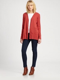 Classically styled cardigan enlivened by dropped shoulders, back cutouts and an asymmetrical hi-lo hem. V-neckButton frontDropped shouldersLong sleevesSlash pocketsBack cutoutsAsymmetrical hi-lo hemCottonMachine washMade in USAModel shown is 5'10 (177cm) wearing US size Small. Classically styled cardigan enlivened by dropped shoulders, back cutouts and an asymmetrical hi-lo hem. V-neckButton frontDropped shouldersLong sleevesSlash pocketsBack cutoutsAsymmetrical hi-lo hemCottonMachine washMade in USAModel shown is 5'10 (177cm) wearing US size Small.