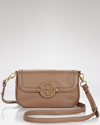 Desk to dinner ease from Tory Burch. This versatile crossbody bag flaunts a day-to-night right shape in classic pebbled leather. Desk to dinner ease from Tory Burch. This versatile crossbody bag flaunts a day-to-night right shape in classic pebbled leather.