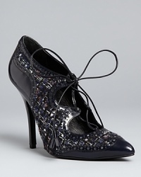 Invigorate your cool weather favorites this fall and beyond in these natty, menswear-inspired Tory Burch pumps, with tweed and leather all laced up. Invigorate your cool weather favorites this fall and beyond in these natty, menswear-inspired Tory Burch pumps, with tweed and leather all laced up.