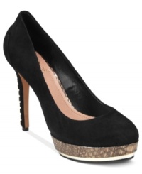 The classic black pump–made better. Vince Camuto's Deba platform pumps feature eye-catching stud details along the heel and a funky, printed platform. The classic black pump–made better. Vince Camuto's Deba platform pumps feature eye-catching stud details along the heel and a funky, printed platform.