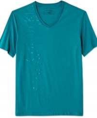 Time to reflect. This glossy logo t-shirt from Calvin Klein lightens up your casual style. (Clearance) Time to reflect. This glossy logo t-shirt from Calvin Klein lightens up your casual style. (Clearance)