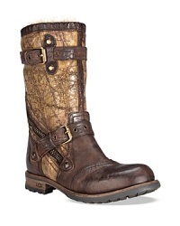 With rugged, bomber-jacket inspired style and vintage good looks from dip dyed leather, these UGG® Collection boots are sure to be frequent fliers. With rugged, bomber-jacket inspired style and vintage good looks from dip dyed leather, these UGG® Collection boots are sure to be frequent fliers.