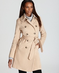Shaped by darts and seaming detail, this DKNY trench coat is a polished layering piece for the cold-weather season, perfect for weekdays and weekends, days and evenings. Shaped by darts and seaming detail, this DKNY trench coat is a polished layering piece for the cold-weather season, perfect for weekdays and weekends, days and evenings.