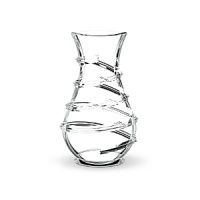 Designed by Thomas Bastide, this elegant Baccarat Carnaval vase will have people stepping right up to see its twirling, spiral design. A narrow neck makes it ideal for arranging flowers. Designed by Thomas Bastide, this elegant Baccarat Carnaval vase will have people stepping right up to see its twirling, spiral design. A narrow neck makes it ideal for arranging flowers.