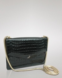 Take after hours into exotic overdrive with Tusk's croc-embossed clutch. The chain-clad compact shines all night, so pair it with a cocktail frock and booties for lasting soirée chic.