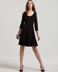 Simple, yet stunning. Shoulder cutouts transform the Karen Kane dress from basic to bold. This LBD makes the shift from office to out in a flash. Simple, yet stunning. Shoulder cutouts transform the Karen Kane dress from basic to bold. This LBD makes the shift from office to out in a flash.