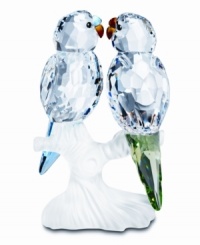 Bring elegant touches of nature into your home with this Swarovski crystal feather friends sculpture. A work or art for your home, this carefully crafted piece features gentle touches of color to enhance any decor.