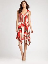 A vibrant, graphic pattern lends a modern edge to this pull-on, wear-everywhere style.ScoopneckSleevelessWaist seamBias-cut skirtHandkerchief hemFully linedAbout 31 from natural waist92% polyester/8% spandexImportedMade in USA of imported fabricModel shown is 5'11 (180) wearing US size Small. A vibrant, graphic pattern lends a modern edge to this pull-on, wear-everywhere style.ScoopneckSleevelessWaist seamBias-cut skirtHandkerchief hemFully linedAbout 31 from natural waist92% polyester/8% spandexImportedMade in USA of imported fabricModel shown is 5'11 (180) wearing US size Small.