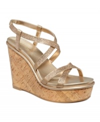 Delight in the finer things with the Relish sandals by Nine West. Shimmering rhinestone detail adds fab glam and the natural cork platform brings seasonal charm. Delight in the finer things with the Relish sandals by Nine West. Shimmering rhinestone detail adds fab glam and the natural cork platform brings seasonal charm.