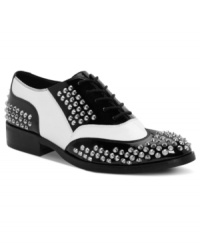 Borrowed from the boys–but way cooler. The Brogue oxford flats from Truth or Dare by Madonna feature high-contrast black and white patent and all-over stud details. Borrowed from the boys–but way cooler. The Brogue oxford flats from Truth or Dare by Madonna feature high-contrast black and white patent and all-over stud details.