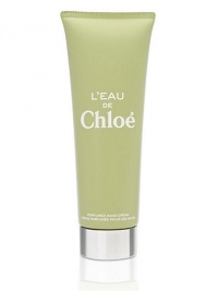 L'Eau de Chloé hand cream is new and exclusive to the Chloé beauty house. The fresh hand cream opens with grapefruit, cedrat and sweet peach blending easily with an original natural rose water, ending with warm notes of cedarwood, patchouli essence and amber for an easy to wear scent. 2.5 oz. L'Eau de Chloé hand cream is new and exclusive to the Chloé beauty house. The fresh hand cream opens with grapefruit, cedrat and sweet peach blending easily with an original natural rose water, ending with warm notes of cedarwood, patchouli essence and amber for an easy to wear scent. 2.5 oz.