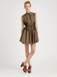 Safari-chic cotton shirtdress has a fabulously flared skirt, drawstring waistband and contrast trim. Point collarSleevelessButton frontDrawstring waistbandSlash pocketsAbout 17 from natural waistCottonDry cleanImportedModel shown is 5'9½ (176cm) wearing US size 2. Safari-chic cotton shirtdress has a fabulously flared skirt, drawstring waistband and contrast trim. Point collarSleevelessButton frontDrawstring waistbandSlash pocketsAbout 17 from natural waistCottonDry cleanImportedModel shown is 5'9½ (176cm) wearing US size 2.