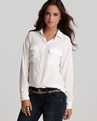 Casual and easy with a luxurious look and feel. This silk shirt from Equipment is the perfect match to your favorite dark-wash jeans. Casual and easy with a luxurious look and feel. This silk shirt from Equipment is the perfect match to your favorite dark-wash jeans.