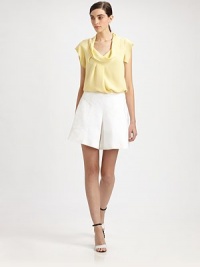 Crisp pleated linen, in a sporty, A-line skort style.Flat frontPleatsPanel constructionBack welt pocketConcealed side zip Inseam, about 6½97% linen/3% cottonDry cleanMade in ItalyModel shown is 5'11 (180cm) wearing US size 4. Crisp pleated linen, in a sporty, A-line skort style.Flat frontPleatsPanel constructionBack welt pocketConcealed side zip Inseam, about 6½97% linen/3% cottonDry cleanMade in ItalyModel shown is 5'11 (180cm) wearing US size 4.