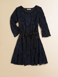 A beautiful crochet lace frock with sash tie and full skirt for a romantic touch.Scalloped scoopneckThree-quarter sleevesPullover styleAdjustable waistband with sashFull skirt55% cotton/45% nylonDry cleanMade in the USA of imported fabric A beautiful crochet lace frock with sash tie and full skirt for a romantic touch.Scalloped scoopneckThree-quarter sleevesPullover styleAdjustable waistband with sashFull skirt55% cotton/45% nylonDry cleanMade in the USA of imported fabric