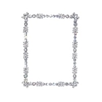 Hand-set Swarovski® crystals add a regal opulence to this brilliant frame. Hand-set Swarovski® crystals add a regal opulence to this brilliant frame.