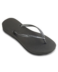 The original style gets an update with more feminine slim looking straps. Wear these basic waterproof rubber flip flops anywhere. Logo embossed solid thong strap and logo debossed cushioned footbed.